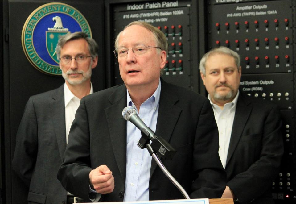 National Nuclear Security Administration Director Frank Klotz, center, talks about the challenges the agency will have as it tries to modernize some of its facilities during a new conference at Sandia National Laboratories in Albuquerque, N.M., on Thursday, May 8, 2014. (AP Photo/Susan Montoya Bryan)
