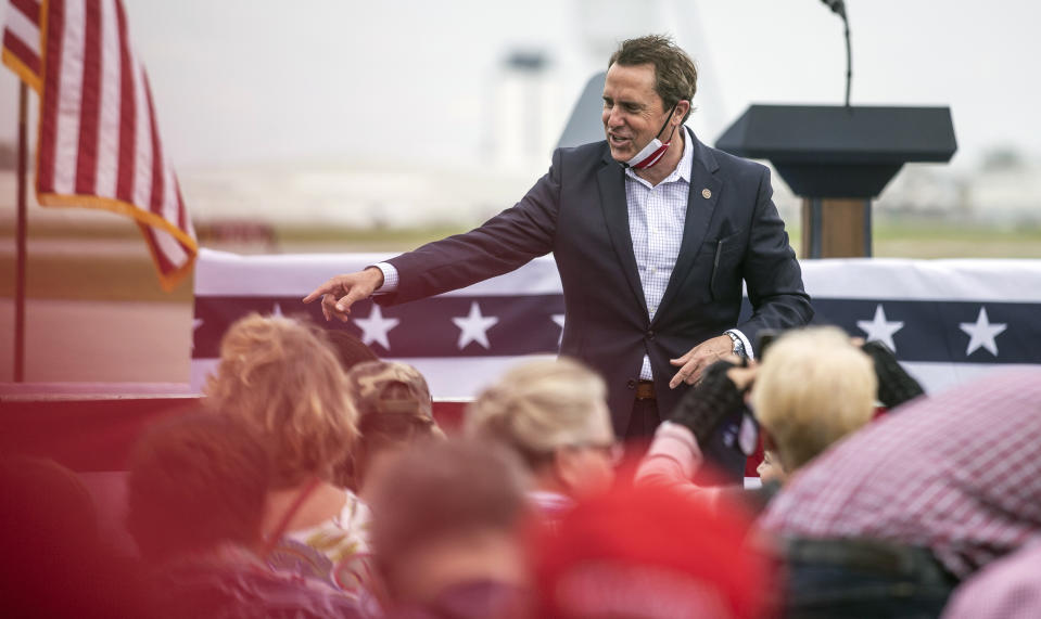 U.S. Rep. Mark Walker greets supporters at a campaign event at the Piedmont Triad International Airport in Greensboro, N.C., Tuesday, Oct. 27, 2020. (Khadejeh Nikouyeh/News & Record via AP)