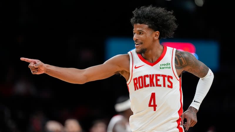 Houston Rockets guard Jalen Green celebrates after a play against the Washington Wizards during the second half of an NBA basketball game Tuesday, March 19, 2024, in Washington. The Rockets won 137-114. (AP Photo/Alex Brandon)