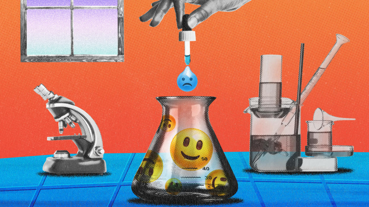 Beaker filled with smiley face emojis having a frowning face emoji added by a dropper