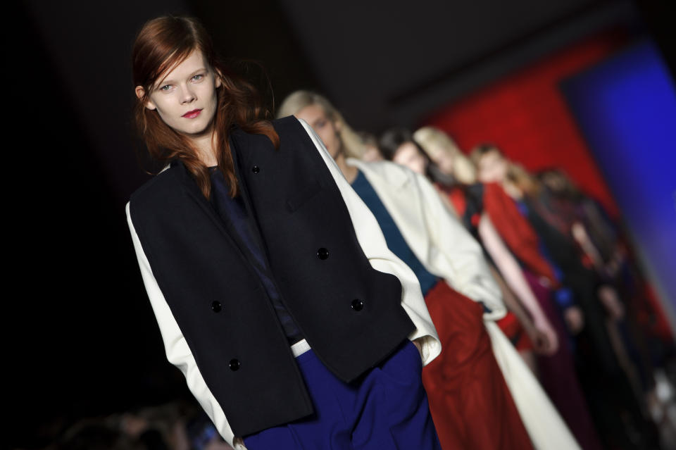 A model wears a design from the Paul Smith collection during London Fashion Week, Sunday, Feb. 17, 2013, London. (Photo by Jonathan Short/Invision/AP)