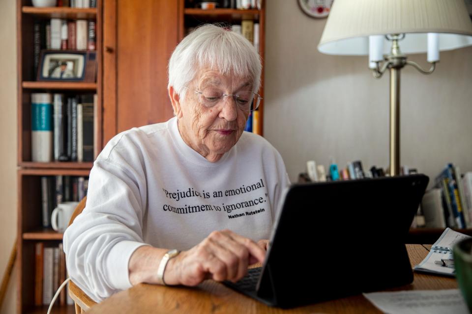 Jane Elliott answers emails and requests to speak at her kitchen table on Wednesday, Dec. 16, 2020, at her home in Northeast Iowa. 