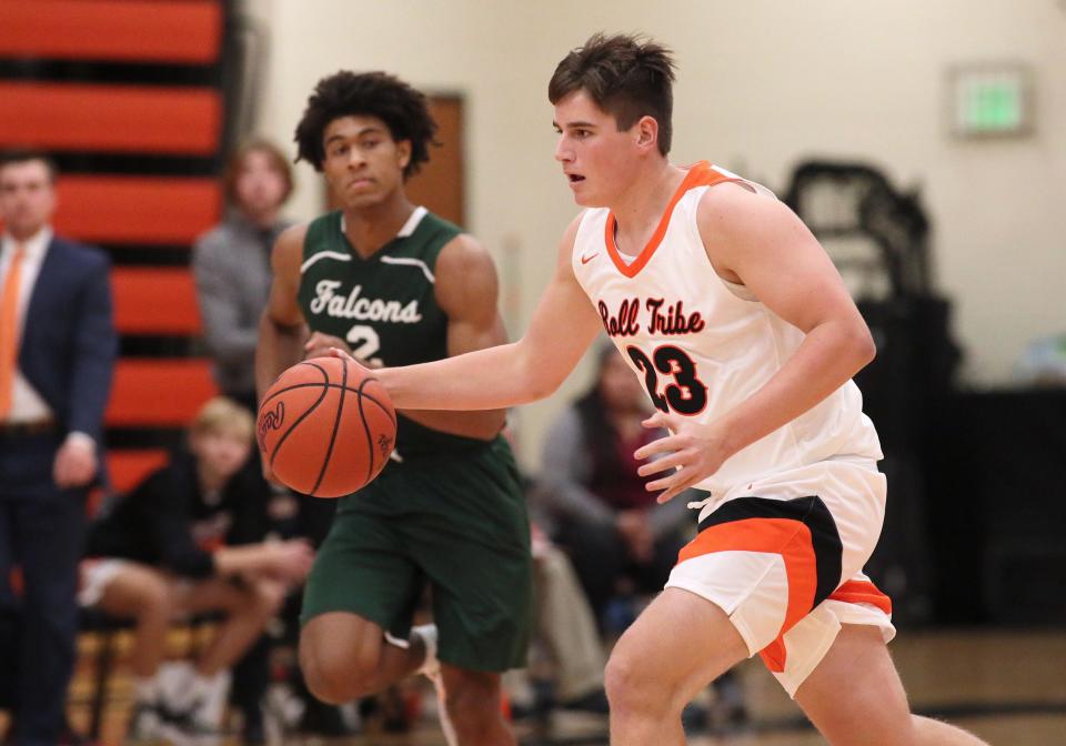 Tecumseh's Ryder Zajac drives the ball up the floor last season against Monroe St. Mary Catholic Central.