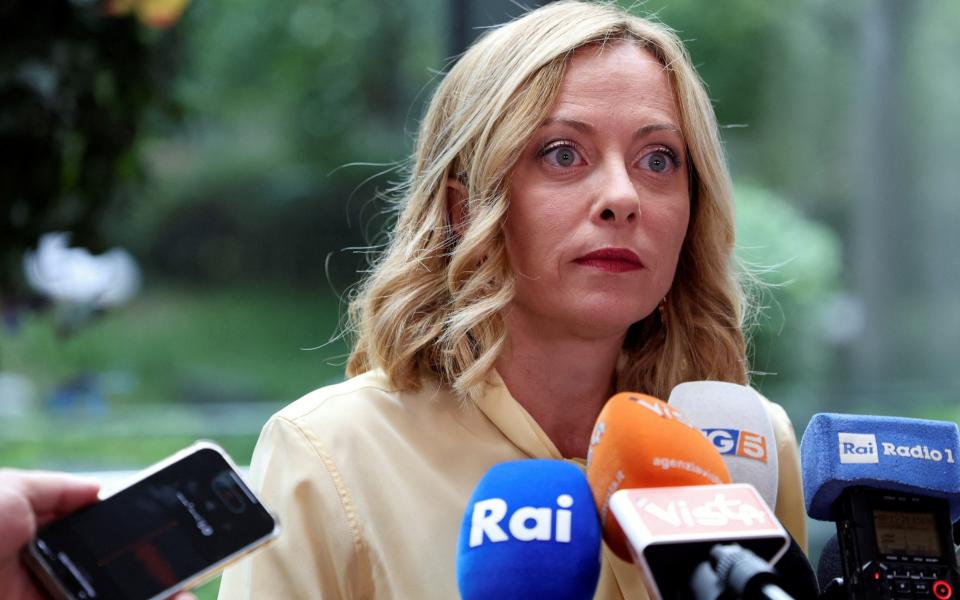 Italian Prime Minister Giorgia Meloni speaks to reporters on a trip to Beijing, China on July 30