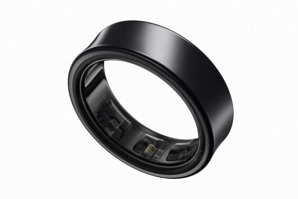 A black metallic ring on a white background