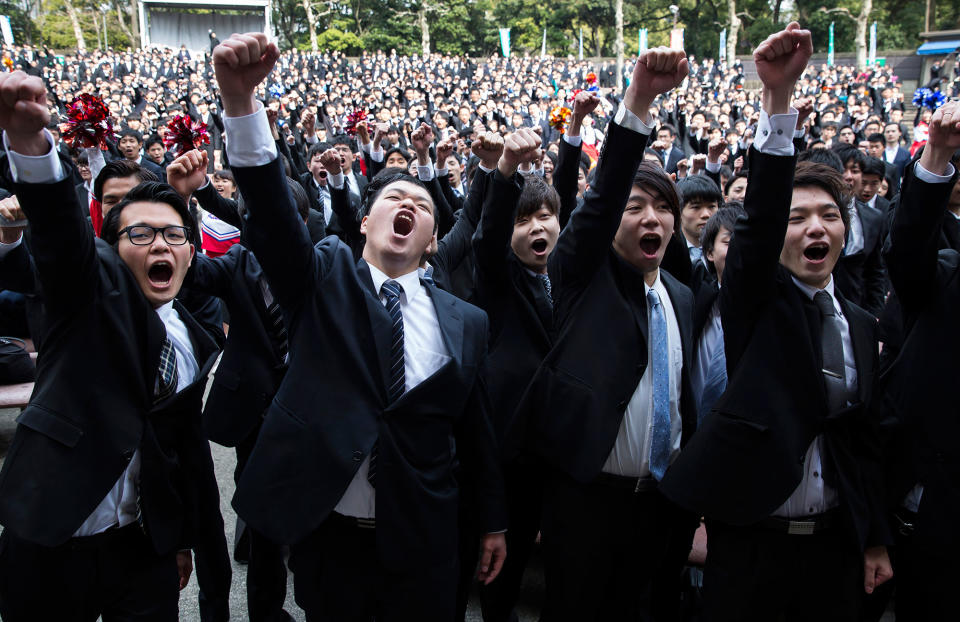 <p>Vocational school students raise their fists during a rally to kick off job-hunting on March 1, 2017 in Tokyo, Japan. About 1,500 students from 11 schools participated in the event ahead of their job-hunting as Japan’s unemployment rate fell to 3.1%, the lowest in 22 years in December, released on January 31. (Tomohiro Ohsumi/Getty Images) </p>