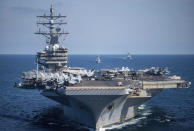 FILE - In this photo released by South Korea Navy via Yonhap, U.S. aircraft carrier USS Ronald Reagan participates with other U.S. and South Korean navy ships during the joint naval exercises between the United States and South Korea in waters off South Korea's eastern coast on Sept. 29, 2022. (South Korea Navy/Yonhap via AP, File)