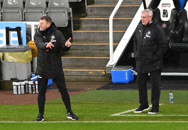 Newcastle united assistant manager Graeme Jones (left) and former manager Steve Bruce.