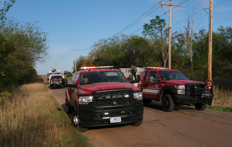 Fire units from all over the metro area converge April 17, 2023, on the area where a structure burns along Waterloo Road at the wildfires in Logan County along Waterloo Road.