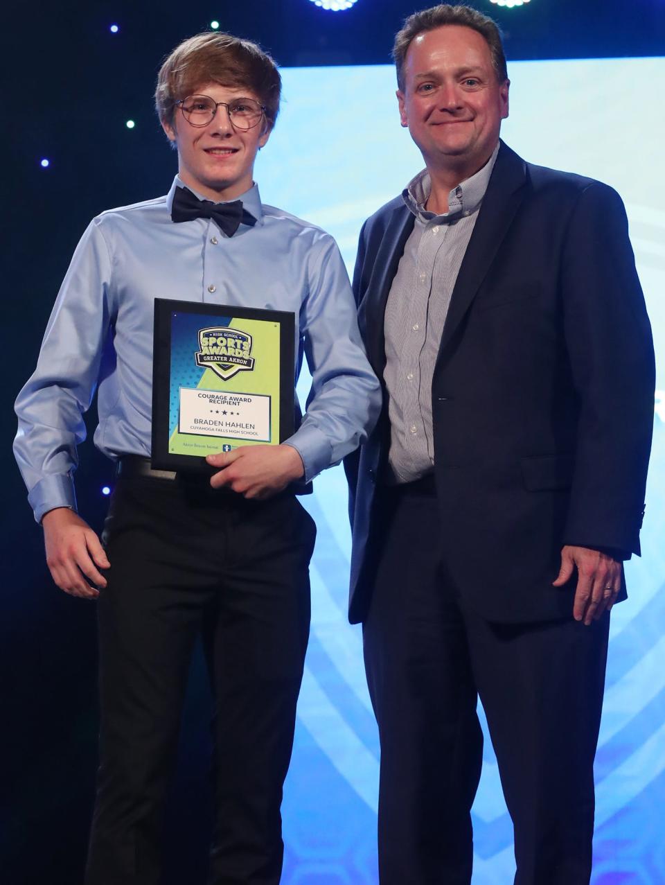 CVCA's Braden Hahlen Greater Akron Courage Award recipient with Michael Shearer Akron Beacon Journal editor at the High School Sports All-Star Awards at the Civic Theatre in Akron on Friday.