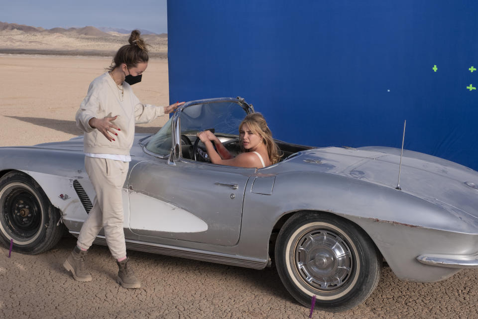Olivia Wilde with Florence Pugh on the set of Don't Worry Darling. (Warner Bros.)