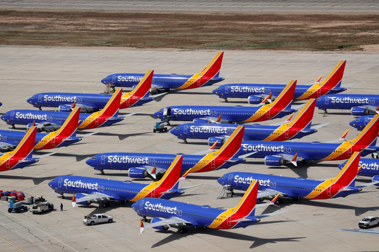 FILE PHOTO: FILE PHOTO: A number of grounded Southwest Airlines Boeing 737 MAX 8 aircraft are shown parked at Victorville Airport in Victorville, California, U.S., March 26, 2019.  REUTERS/Mike Blake