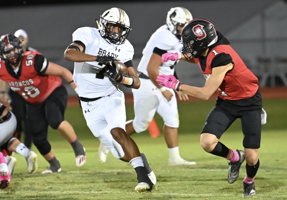 Sonora High School's Jackson Carroll (1) closes in to try to make the tackle against Brady's J.D. Ibarra in a District 2-3A Division II football game at Sonora in 2021.