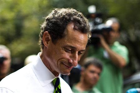 New York City Democratic mayoral candidate Anthony Weiner leaves a polling center after casting his vote during the primary election in New York September 10, 2013. REUTERS/Eduardo Munoz