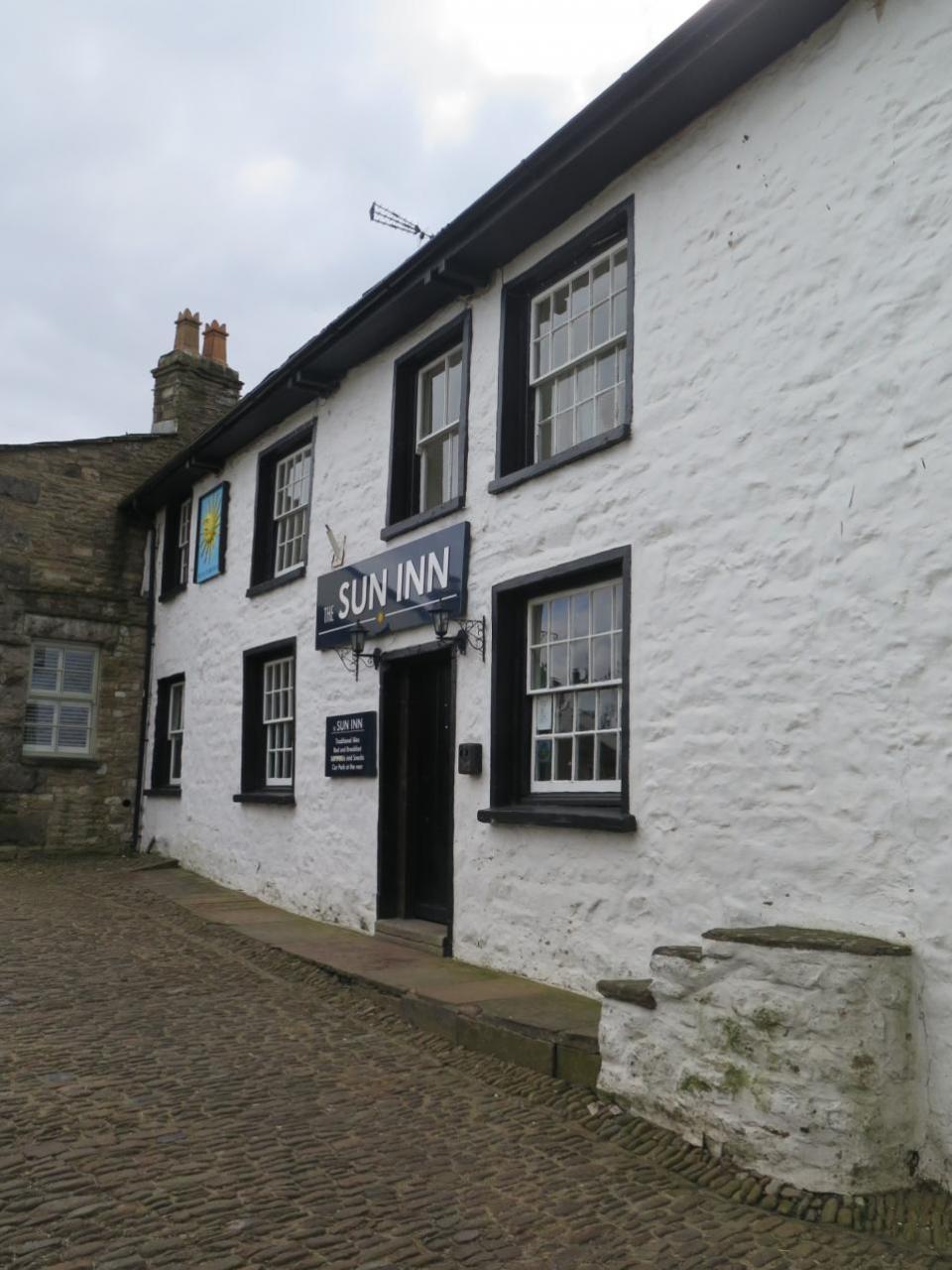 Craven Herald: The community of Dentdale is planning a buy-out of its pub, The Sun Inn.