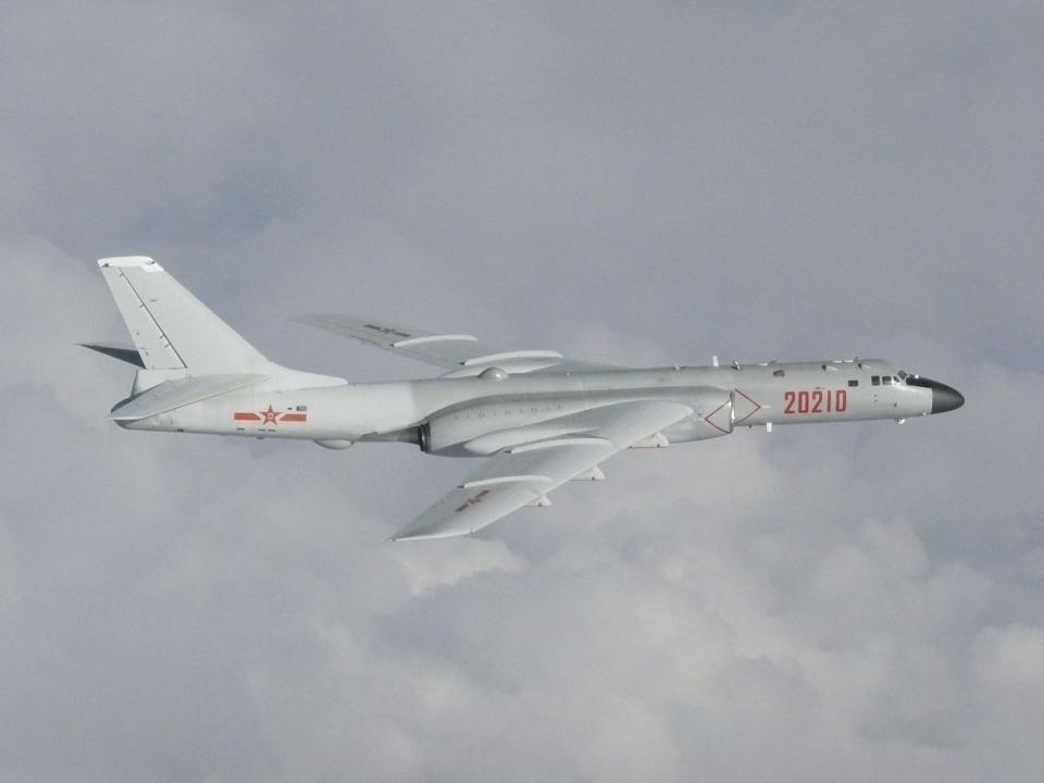 FILE PHOTO: A Chinese H-6 bomber flies over East China Sea in this handout picture taken by Japan Air Self-Defence Force and released by the Joint Staff Office of the Defense Ministry of Japan July 23, 2019. Joint Staff Office of the Defense Ministry of Japan/HANDOUT via REUTERS 