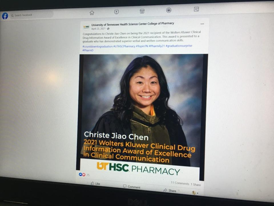 A laptop computer shows a Facebook post from the University of Tennessee Health Science Center College of Pharmacy about an award that Christe Chen won in 2021.