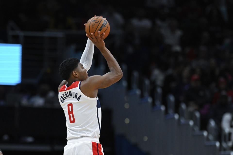 Washington Wizards forward Rui Hachimura (8) shoots during the first quarter of an NBA basketball game against the New Orleans Pelicans, Monday, Jan. 9, 2023, in Washington. (AP Photo/Terrance Williams)