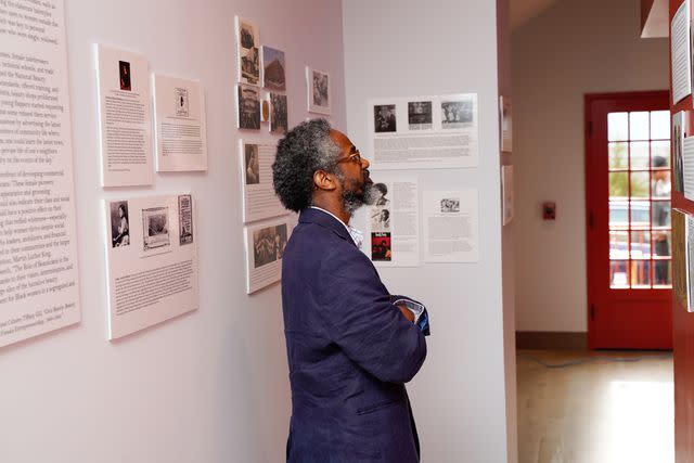 <p>Jared Siskin/Patrick McMullan via Getty Images</p> Quincy Mills attends the opening of the Southampton African American Museum.