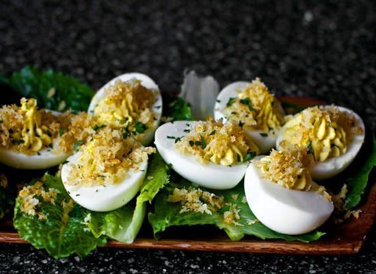 <strong>Get the <a href="http://smittenkitchen.com/2011/12/caesar-salad-deviled-eggs/" target="_hplink">Caesar Salad Deviled Eggs recipe from SmittenKitchen.com</a></strong>