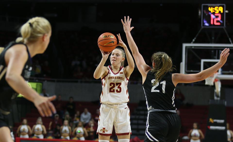 Iowa State guard Kelsey Joens (23) attempts a three-point shot over Truman State guard Emma Bulman (21) during Wednesday’s exhibition at Hilton Coliseum.