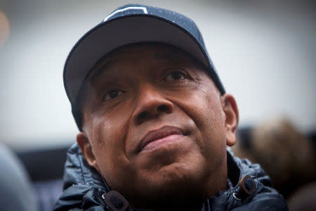 FILE PHOTO: Rap mogul Russell Simmons speaks at a news conference along with members of Justice League NYC to present a list of demands at City Hall in New York, U.S. December 10, 2014. REUTERS/Andrew Kelly/File Photo