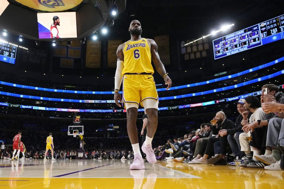 Lakers forward LeBron James walks to the corner of the court during a win over the New Orleans Pelicans.