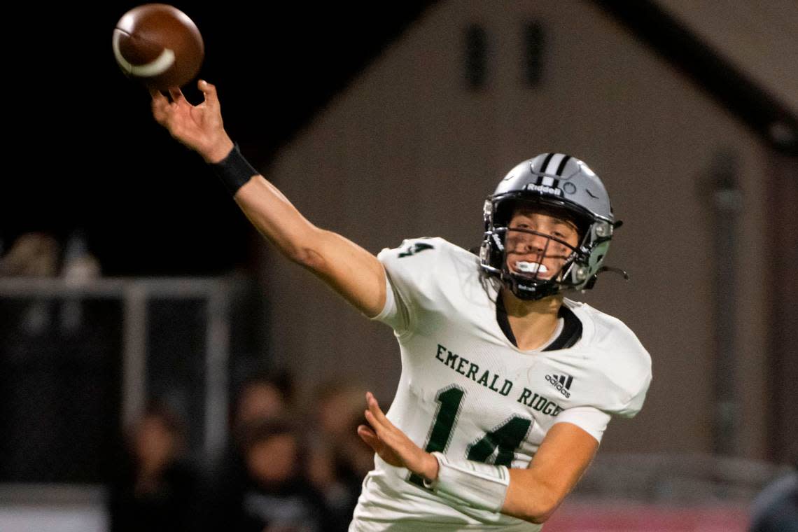 Emerald Ridge quarterback Jake Schakel attempts a pass during the third quarter of a 4A SPSL game against Sumner on Friday, Sept. 16, 2022, at Sunset Chev Stadium in Sumner, Wash.