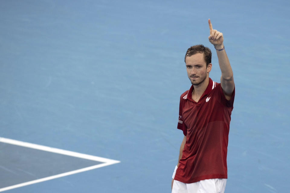 Daniil Medvedev of Russia reacts to winning his match against Canada's Felix Auger-Aliassime during their semifinal match at the ATP Cup tennis tournament in Sydney, Saturday, Jan. 8, 2022. (AP Photo/Steve Christo)