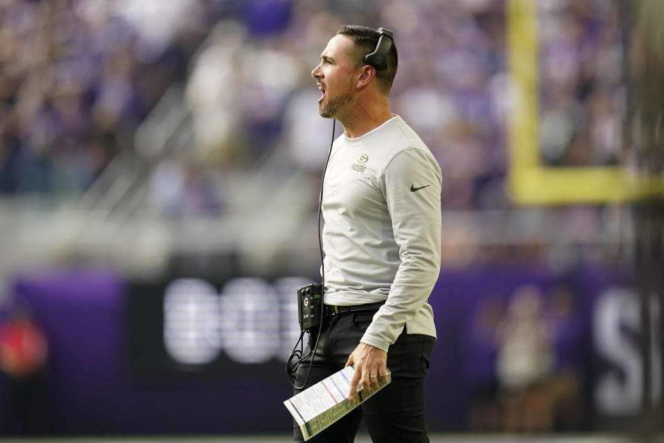 Green Bay Packers head coach Matt LaFleur directs his team during the first half of an NFL football game against the Minnesota Vikings, Sunday, Sept. 11, 2022, in Minneapolis. (AP Photo/Abbie Parr)
