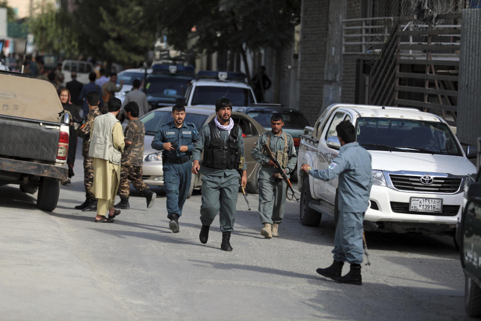 Afghan security personnel arrives at the area where the director of Afghanistan's Government Information Media Center Dawa Khan Menapal was shot dead in Kabul, Afghanistan, Friday, Aug. 6, 2021. The Taliban shot and killed the director of Afghanistan's Government Information Media Center on Friday, the latest killing of a government official and one that comes just days after an assassination attempt on the acting defense minister. (AP Photo/Rahmat Gul)