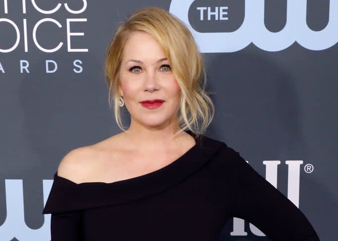 Christina Applegate in an elegant off-shoulder gown at an awards event