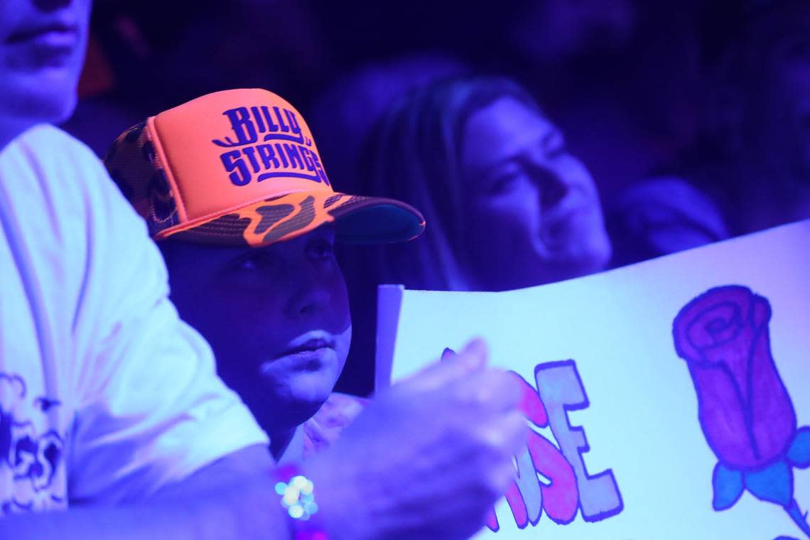 A young concert goer got his wish during the April 26, 2024 Rupp Arena Billy Strings concert. The Bluegrass musician played “My Rose of Old Kentucky” after seeing the request sign from the audience. Tasha Poullard/tpoullard@herald-leader.com