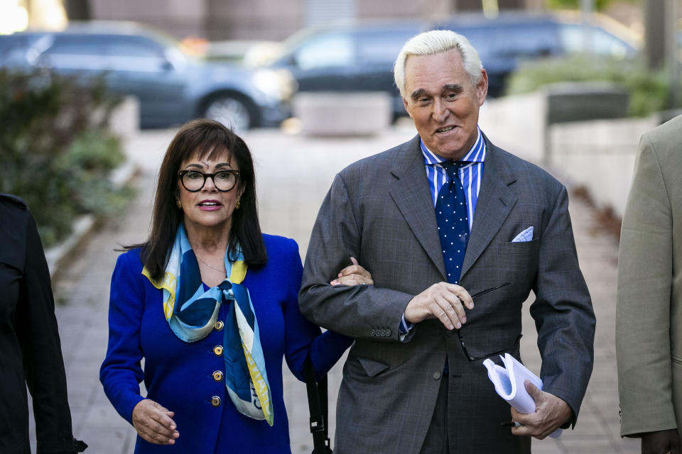 Roger Stone, and his wife Nydia, arrive at Federal Court for his federal trial in Washington, Friday, Nov. 8, 2019. (AP Photo/Al Drago)