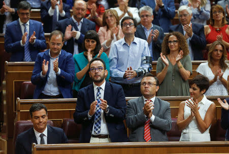 Spain's Socialist party (PSOE) leader Pedro Sanchez (front L) is applauded by party members after delivering a speech during an investiture debate at parliament in Madrid, Spain August 31, 2016. REUTERS/Andrea Comas