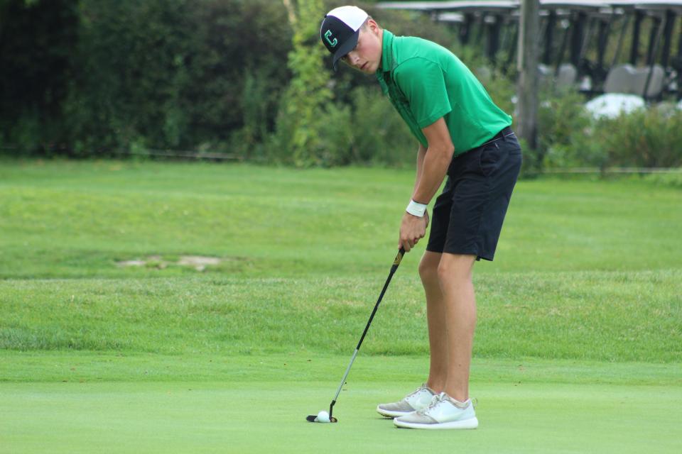 Clear Fork's Nate Lind takes a putt at the Tyger Invitational. Lind finished with the third lowest individual score at the tournament.