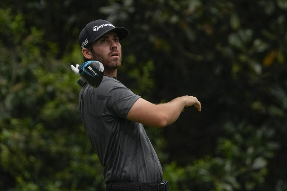 Matthew Wolff watches his tee shot on the 11th hole during the second round of the Masters golf tournament on Friday, April 9, 2021, in Augusta, Ga. (AP Photo/Gregory Bull)