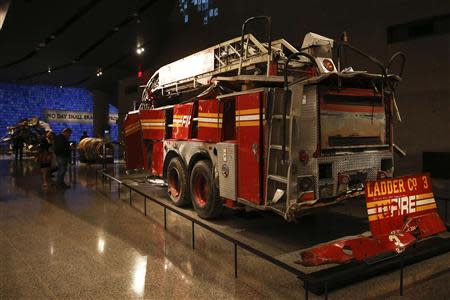 A FDNY fire truck from Ladder Co. 3 is seen inside the National September 11 Memorial & Museum during a press preview in New York May 14, 2014. REUTERS/Shannon Stapleton