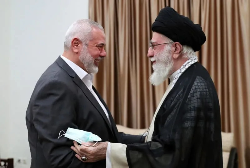 Palestinian Hamas leader Ismail Haniyeh (L) greets Iranian Supreme Leader Ayatollah Ali Khamenei in Tehran. Iranian Supreme Leader Ayatollah Ali Khamenei has threatened "severe punishment" for Israel in retaliation for the assassination of Haniyeh in Tehran. "The criminal Zionist regime [Israel] has murdered our guest in our house," Khamenei was quoted as saying on his website. "There will be a severe punishment." Iranian Supreme Leader's Office/ZUMA Press Wire/dpa