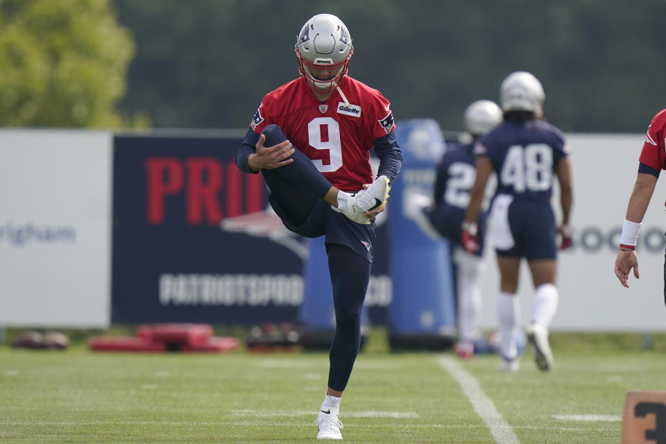 New England Patriots quarterback Jake Dolegala (9) warms up during an NFL football practice, Thursday, July 29, 2021, in Foxborough, Mass. (AP Photo/Steven Senne)