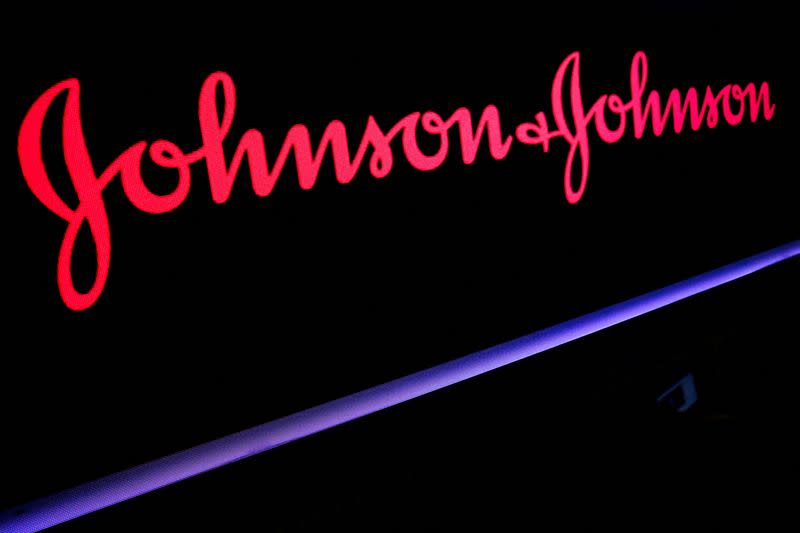 FILE PHOTO: The Johnson & Johnson logo is displayed on a screen on the floor of the NYSE in New York