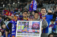 FC Barcelona fans react ahead of the match against the A-Leagues All Stars' at Stadium Australia in Sydney, Australia, Wednesday, May 25, 2022. (AP Photo/Rick Rycroft)