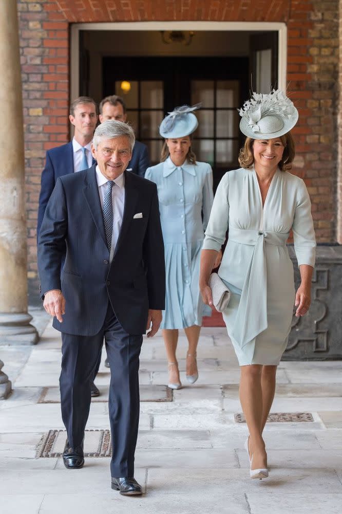 Carole Middleton (front, with husband Michael) in a Botterill hat at Prince Louis's christening in July.