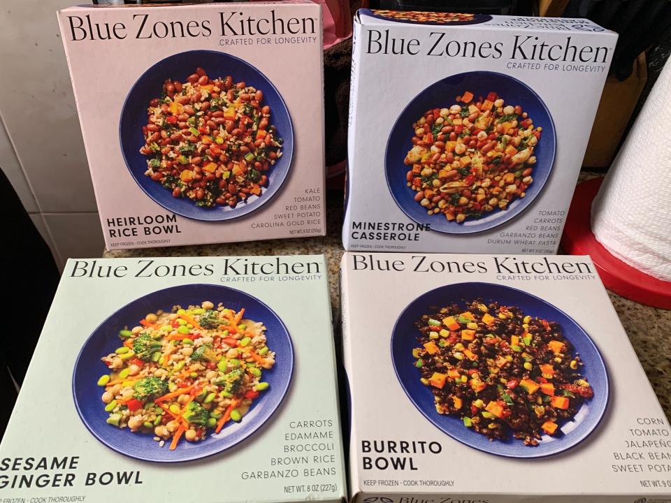 four boxes of Blue Zones frozen meals