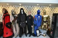 Steve Sansweet -- the owner of Rancho Obi-Wan -- stands alongside among items from his Star Wars collection in Petaluma, California, on November 24, 2015