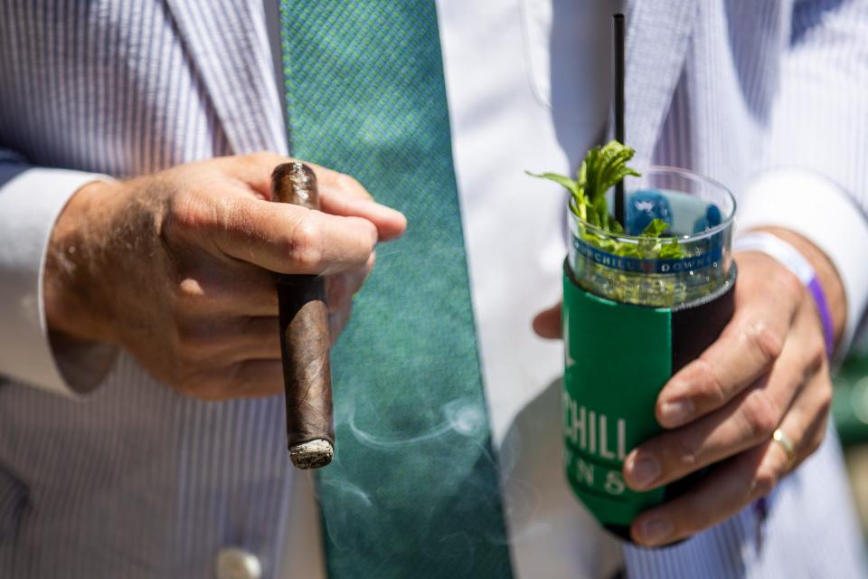 Cigars and mint juleps on the day of the 147th Kentucky Derby at Churchill Downs. May 1, 2021