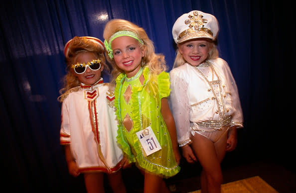 Three young girls in beauty pageant