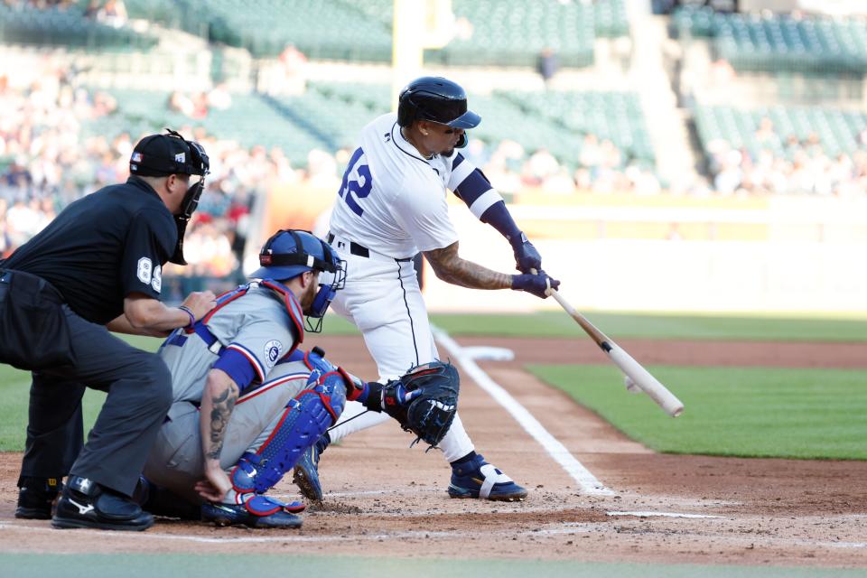 Apr 15, 2024; Detroit, Michigan, USA; Detroit Tigers shortstop Javier Baez hits against the Texas Rangers at Comerica Park.