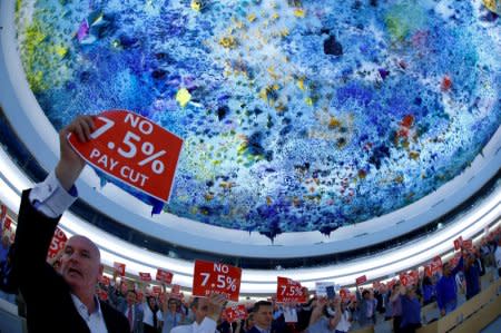 United Nations and other agencies staff demonstrate against a planned 7,5 % salary cut at the U.N. in Geneva, Switzerland, May 24, 2017. REUTERS/Denis Balibouse