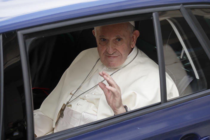 Pope Francis waves from a car as he leaves Dublin Castle at the end of his meeting with Irish Prime Minister Leo Varadkar, in Dublin, Ireland, Saturday, Aug. 25, 2018. Pope Francis is on a two-day visit to Ireland. (AP Photo/Matt Dunham)